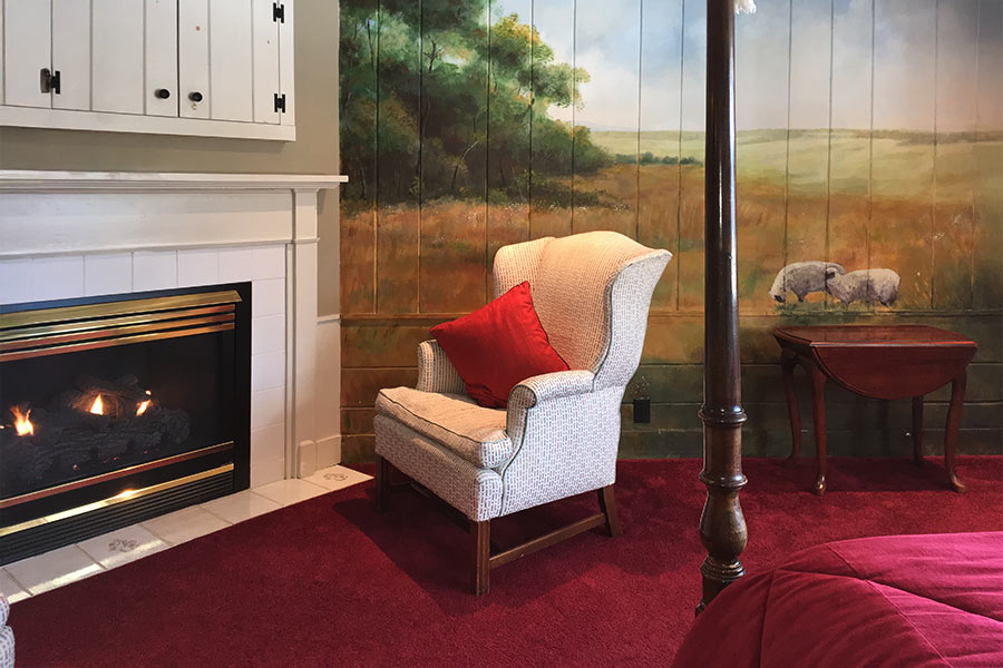 Apple Blossom Room fire and chair